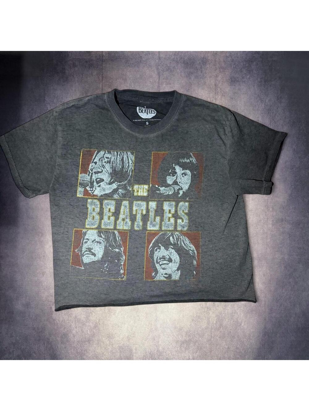 The Beatles band cropped tee with graphic of four band members' faces